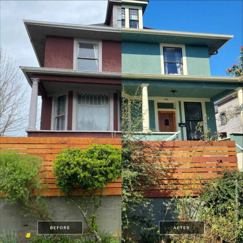 Professional exterior painters in Vancouver applying durable paint to a residential home