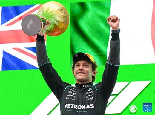 Kimi antonelli's first race victory in china. On the top step of the podium