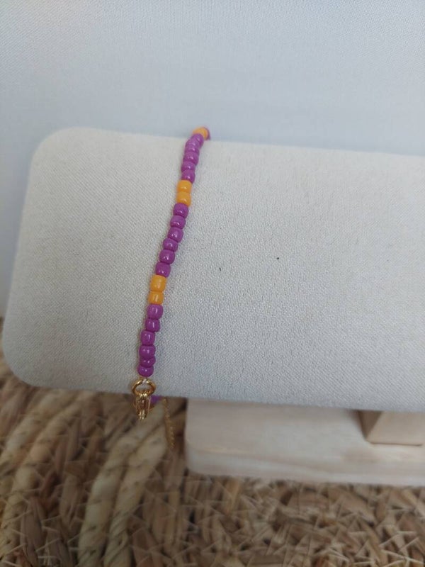 Armbandje paars geel goud