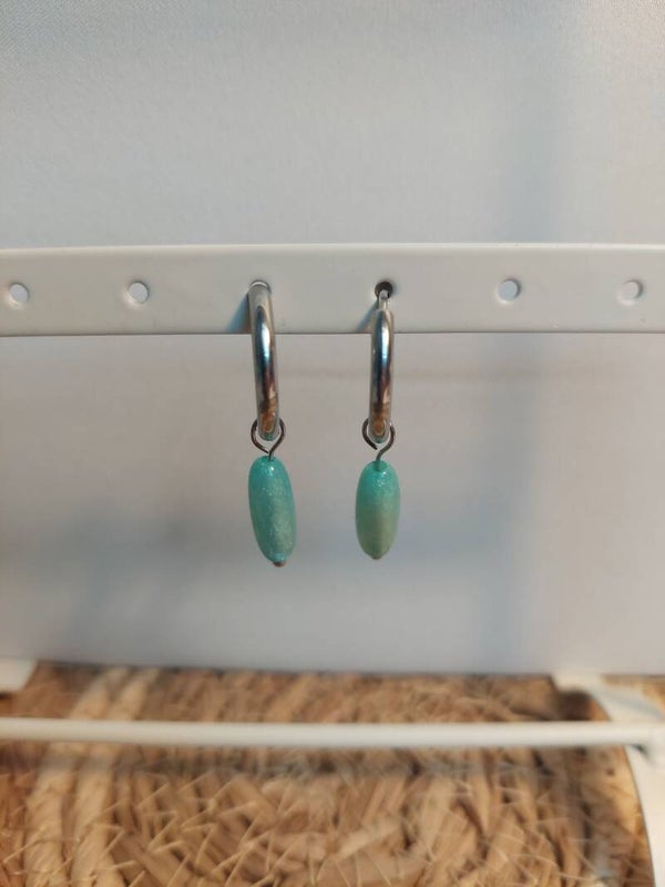 Oorringen rvs zilverkleurig met blauwe hanger