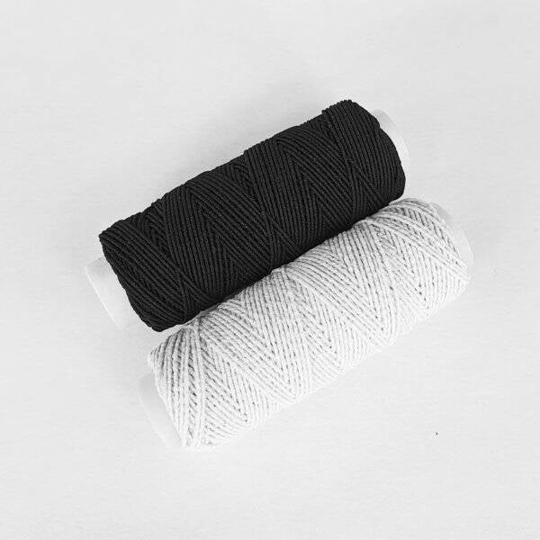 Rimpelelastiek op klos zwart en wit