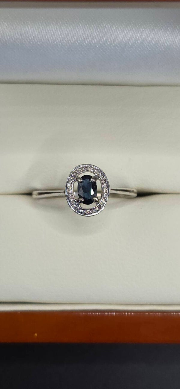 Beautiful 9ct White Gold Oval Sapphire and Diamond Halo Ring. Size L