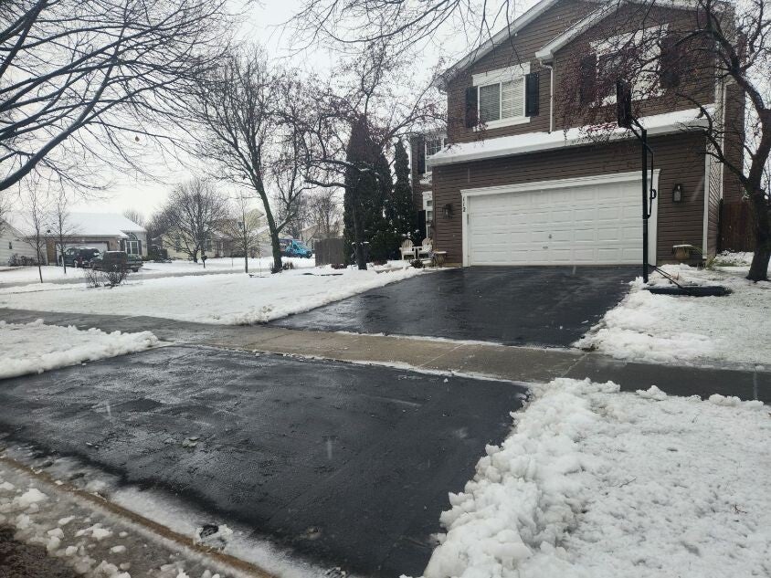 Residential driveway snow removal in Aurora, IL