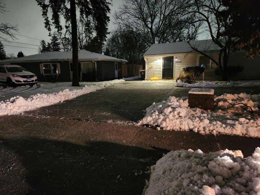 Residential driveway snow plowing in Aurora, Illinois