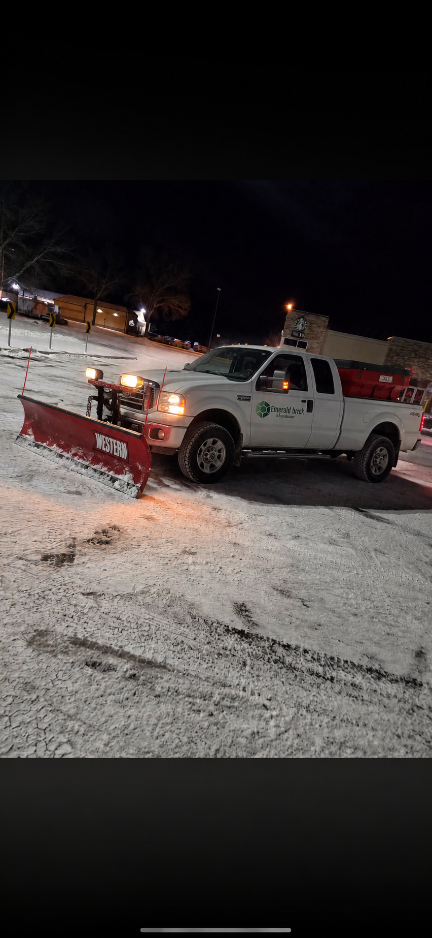 Commercial snow removal site plan showing parking-lot plowing and sidewalk clearing areas in Aurora, Illinois