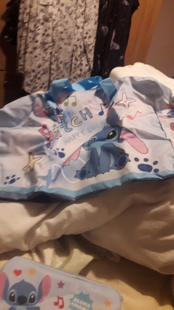 Stitch handbag medium to large blue n pink bow in new case zip up plastic .