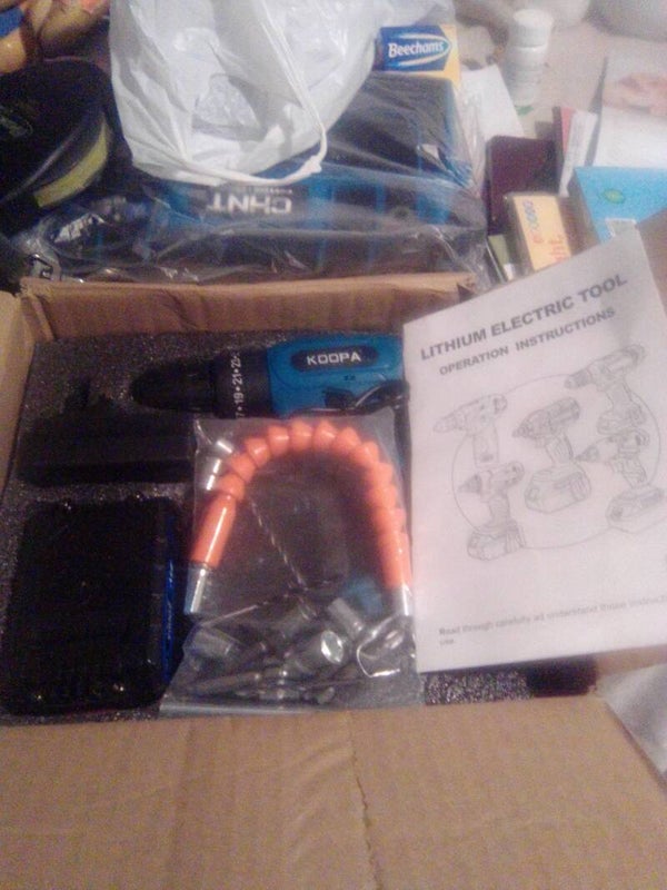 New hand drill  and accessories in box