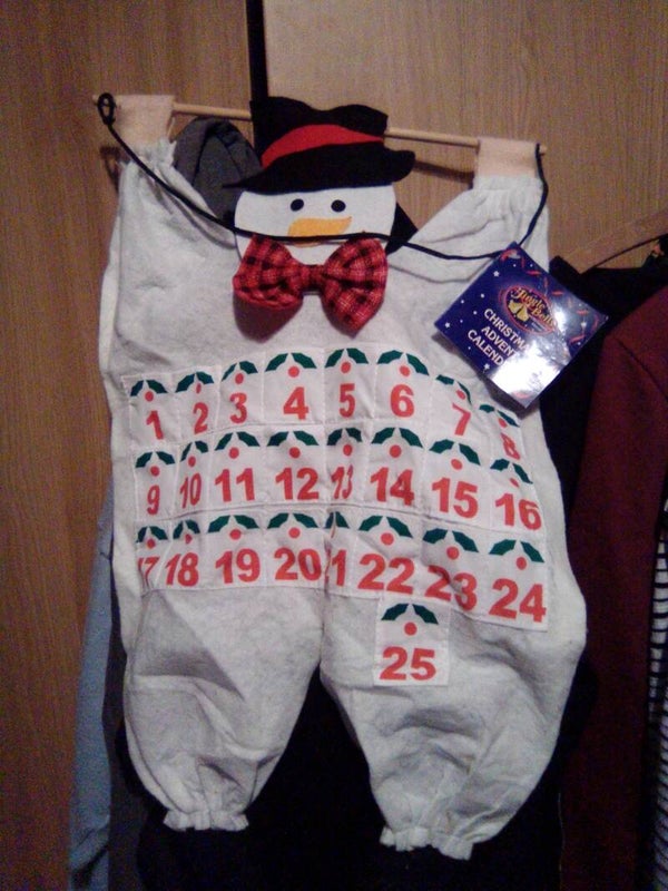 Snowman felt cloth Xmas advent calendar to put sweeties in for up to Santa coming