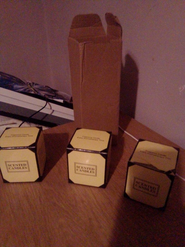 3 new scented candles small in boxes ,