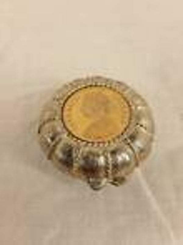 Estée Lauder “Lucky Coin” miniature — 1979