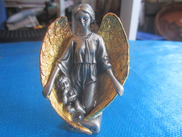 metalen Engel met kind