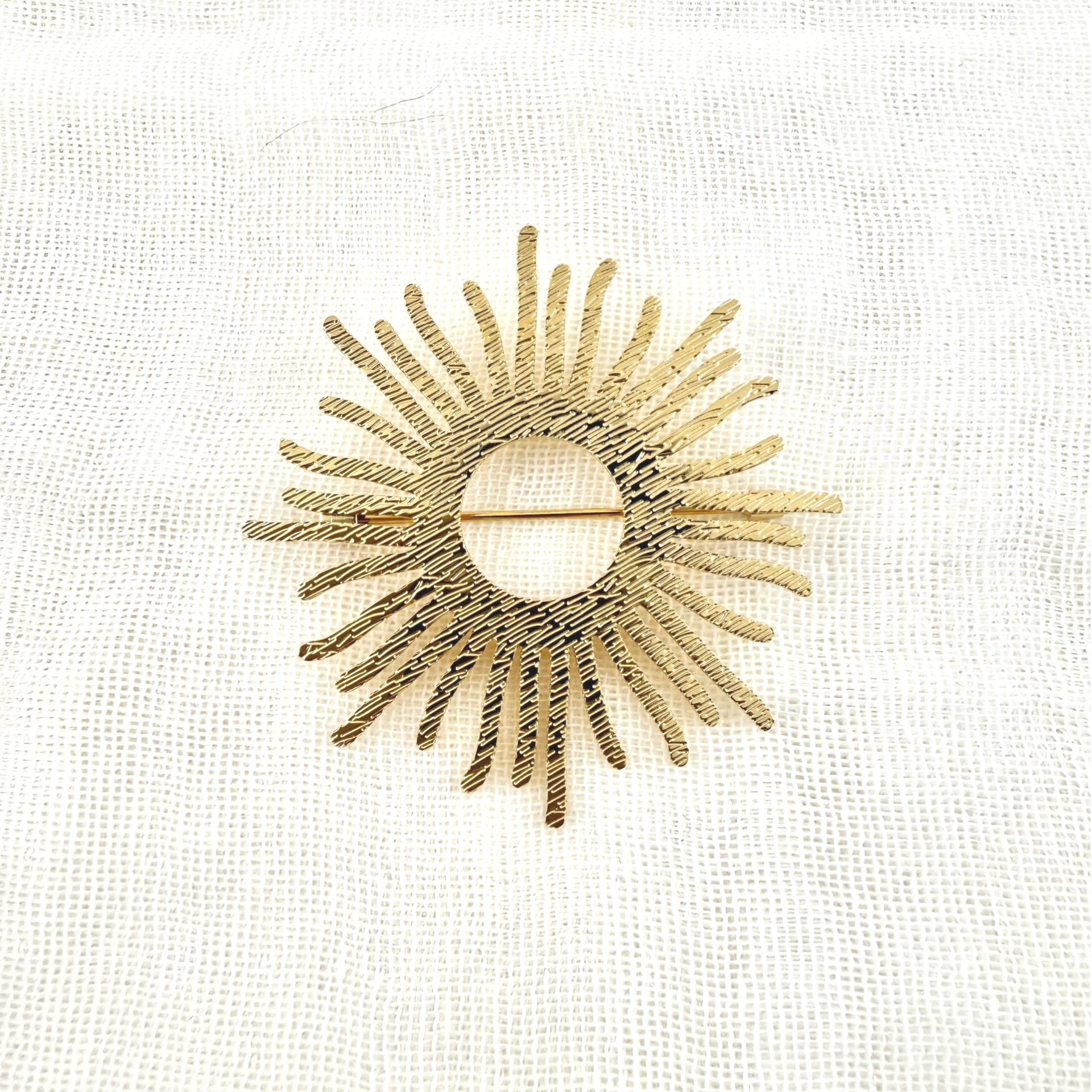 Broche Sun