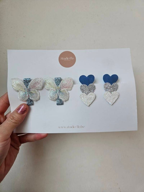 Bestelling Nikita setje hartjesspeldjes (blauw,grijs,wit)+ setje vlinderspeldjes (blauw,wit)