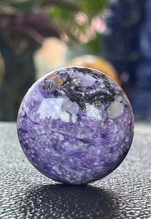 Charoiet edelsteen cabochon rond uit Siberië, medium