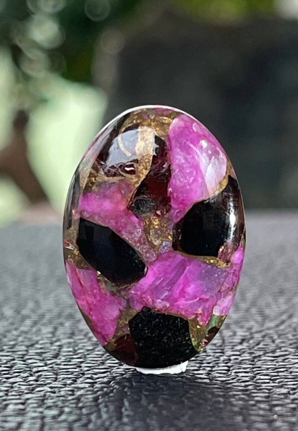 Calciet edelsteen met Koper cabochon ovaal, medium