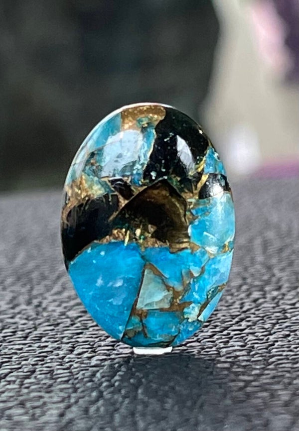 Calciet edelsteen met Koper cabochon ovaal, medium