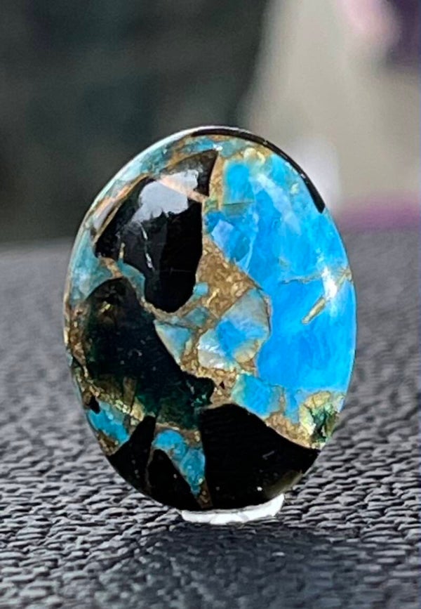 Calciet edelsteen met Koper cabochon ovaal, medium