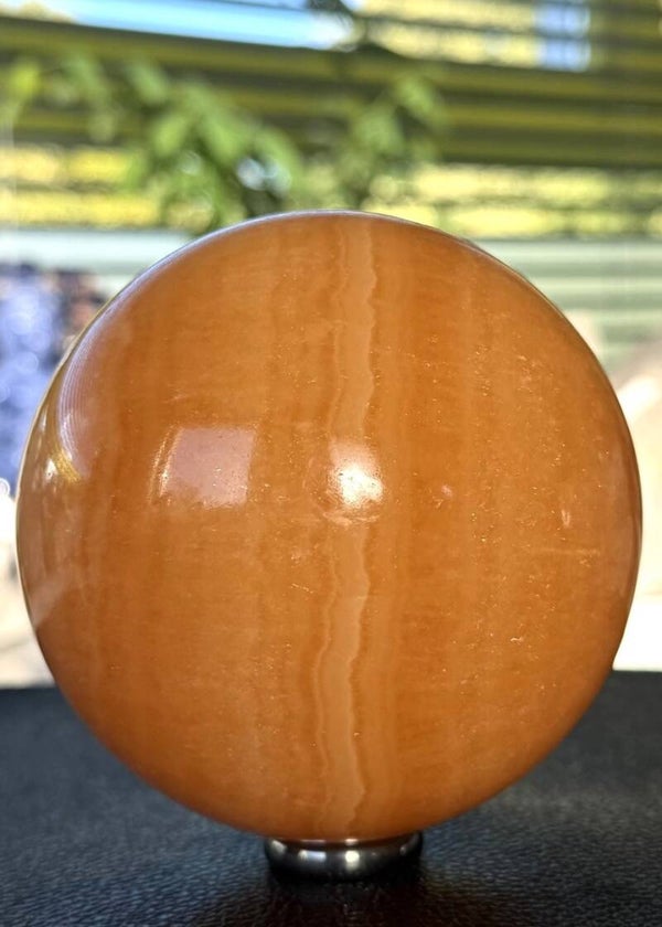 Oranje Calciet bol uit Mexico, groot 10cm
