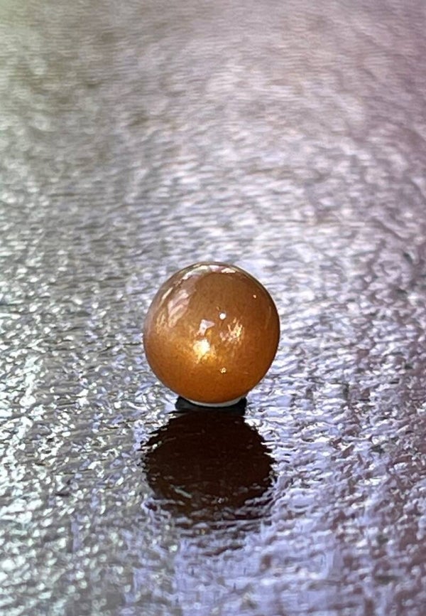 Zonnesteen met ster edelsteen cabochon rond, klein