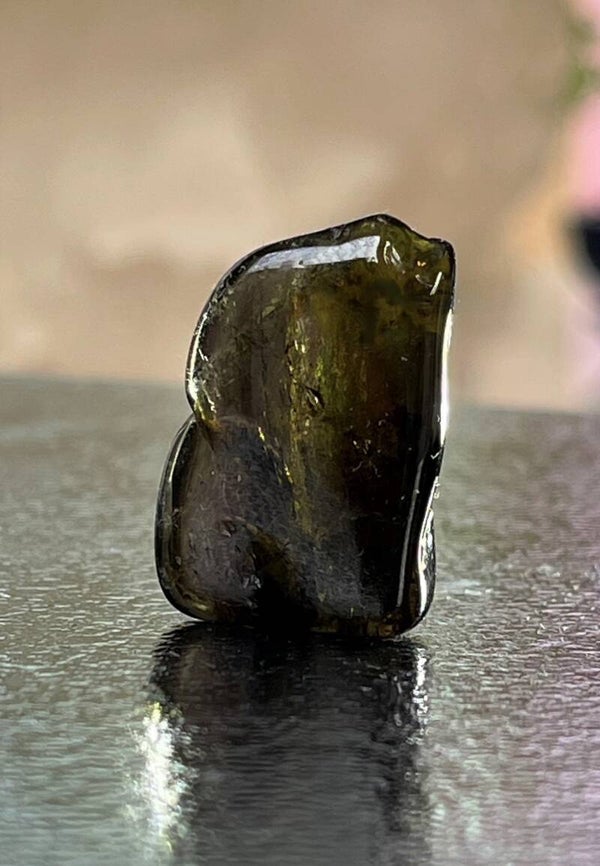 Groene Toermalijn trommelsteen plat