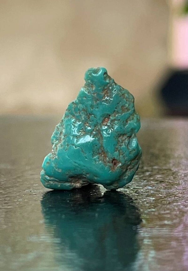 Turkoois trommelsteen plat