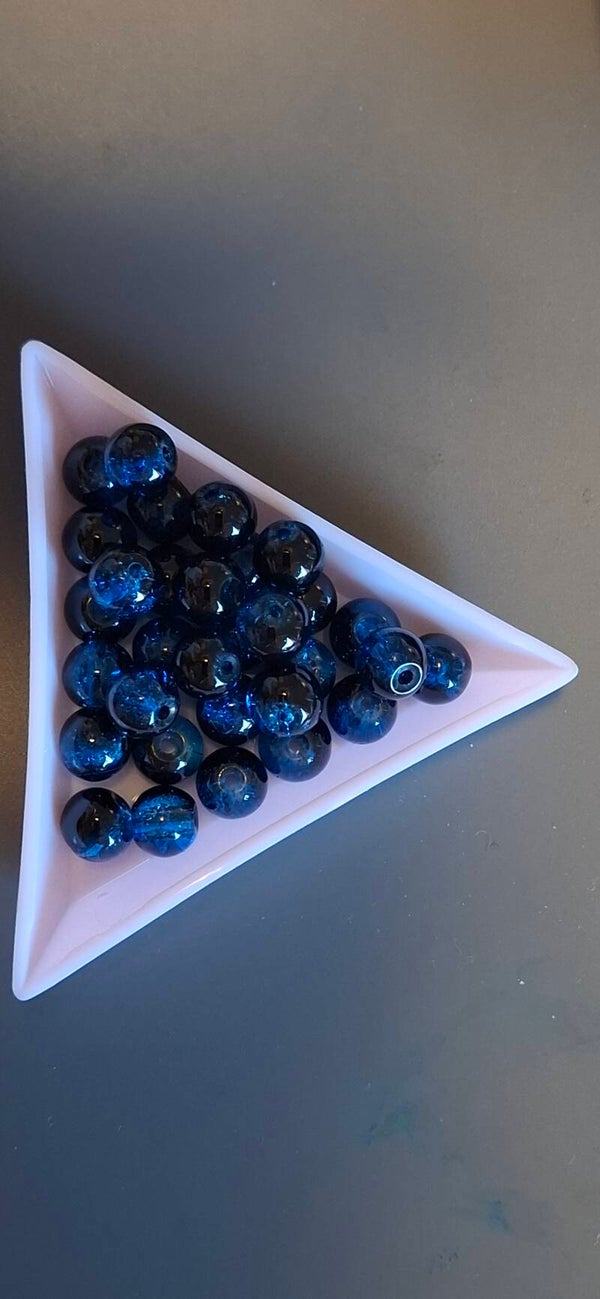 604. Svartblå perler
