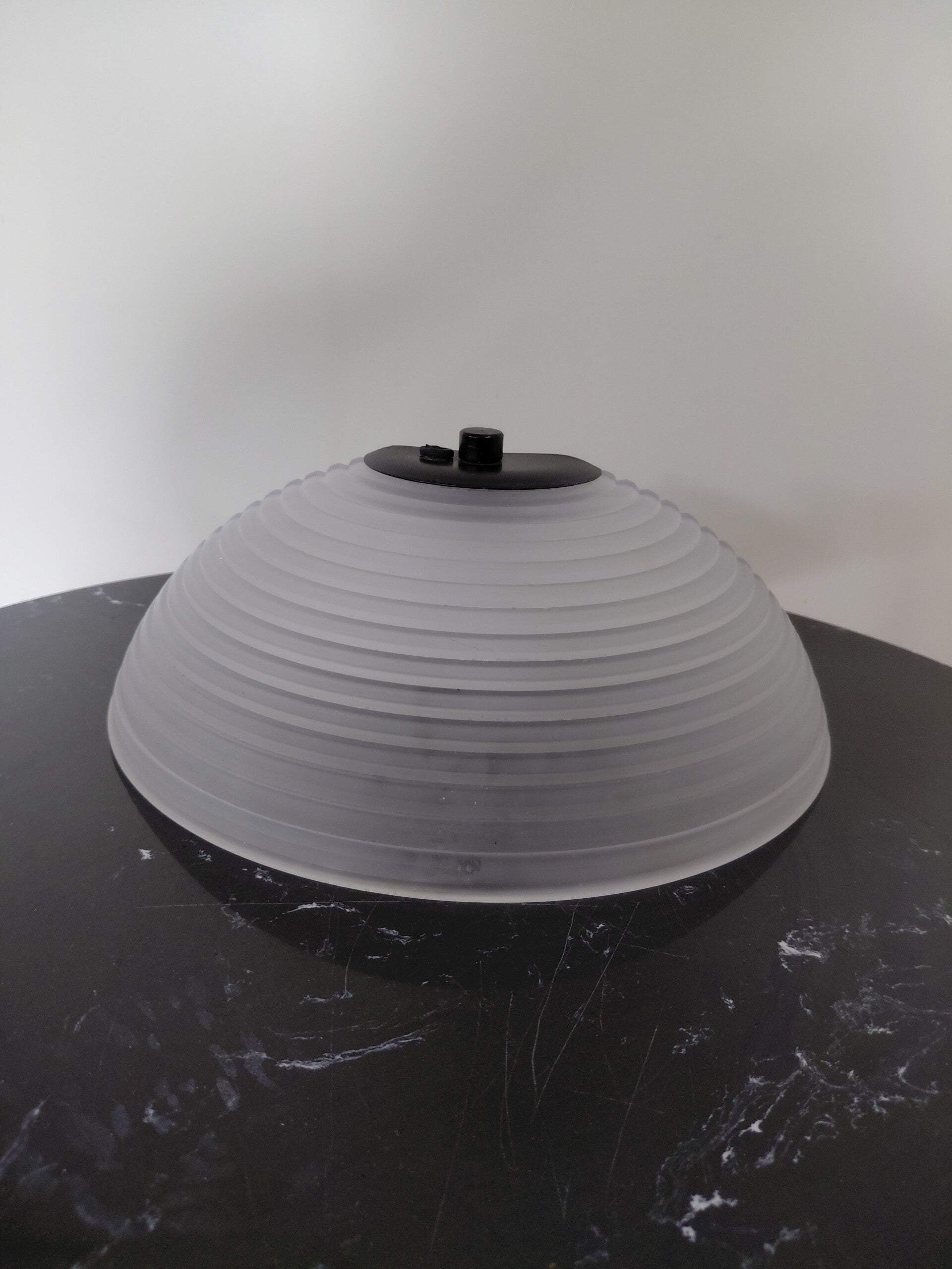 Een Egina Angelo Mangiatti wand en plafondlamp