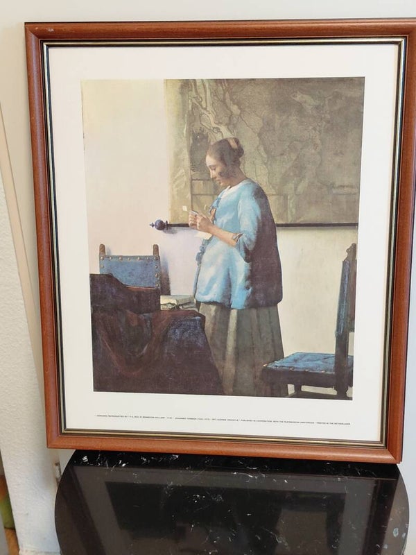 Meisje in blauw op hout Vermeer