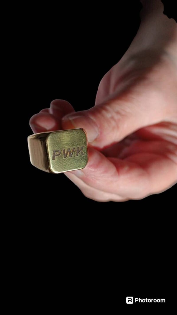 Sygnet z logo PWK