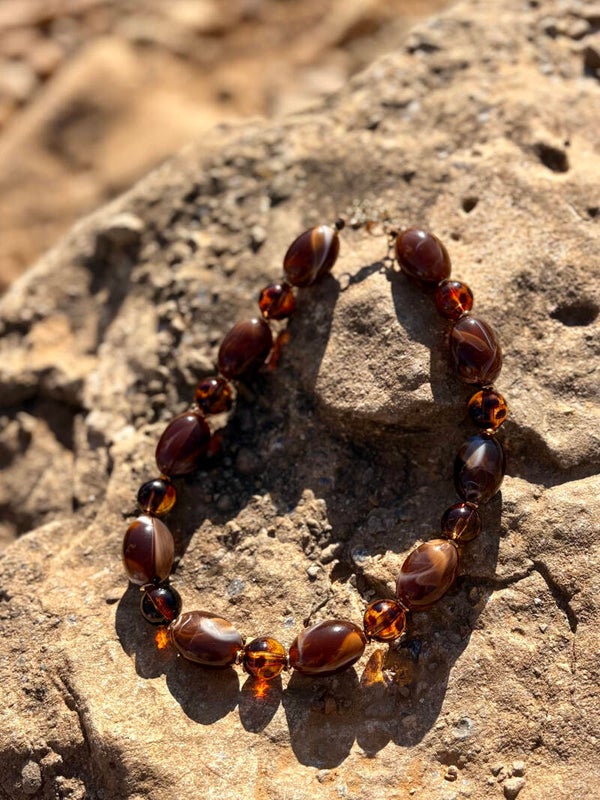 Collier perles brunes