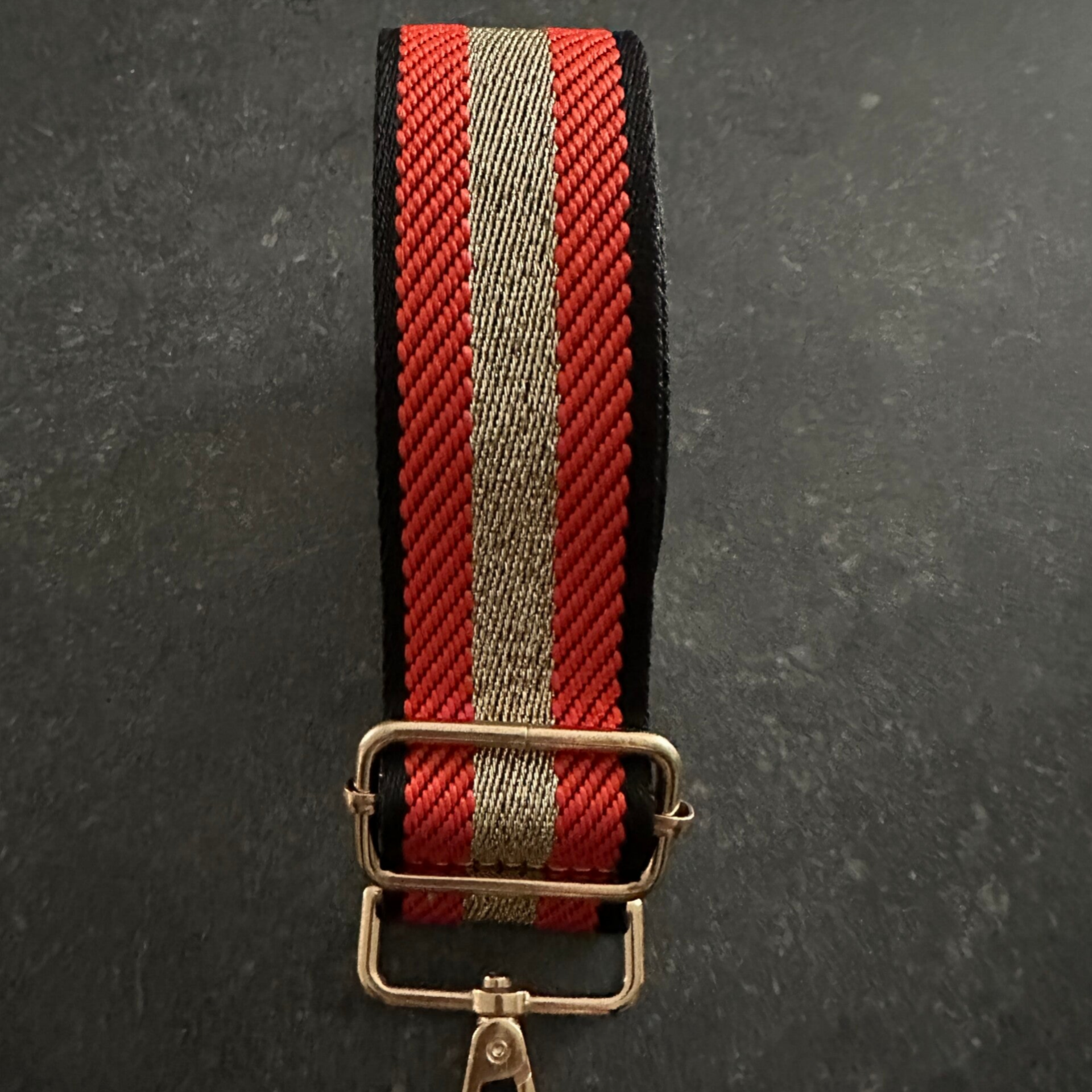 Bag strap / Tassenriem zwart met oranje en goud