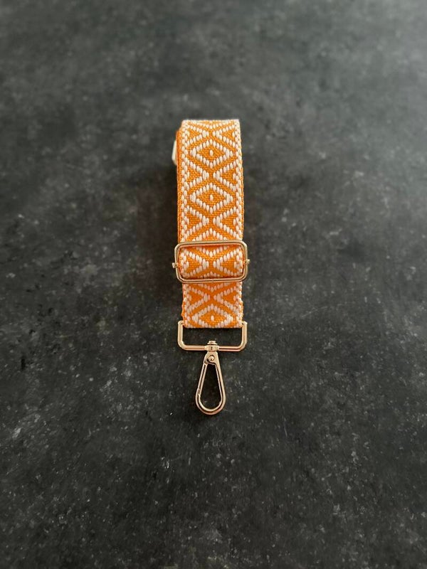 Bag strap / Tassenriem lichtoranje. met wit