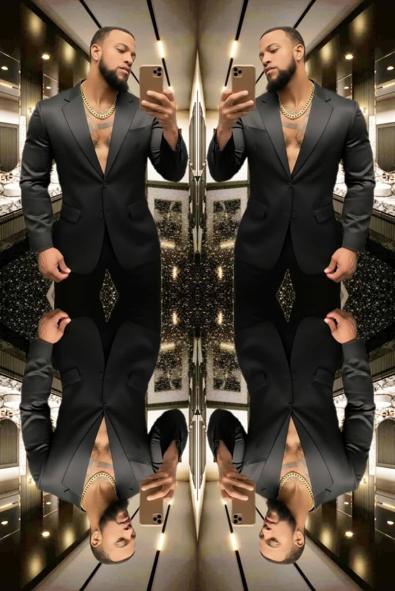 Maurice Holmes fitness trainer, mindset coach, sexual wellness coach and digital artist–dressed in Armani business suit. Exuding bold confidence and luxury.