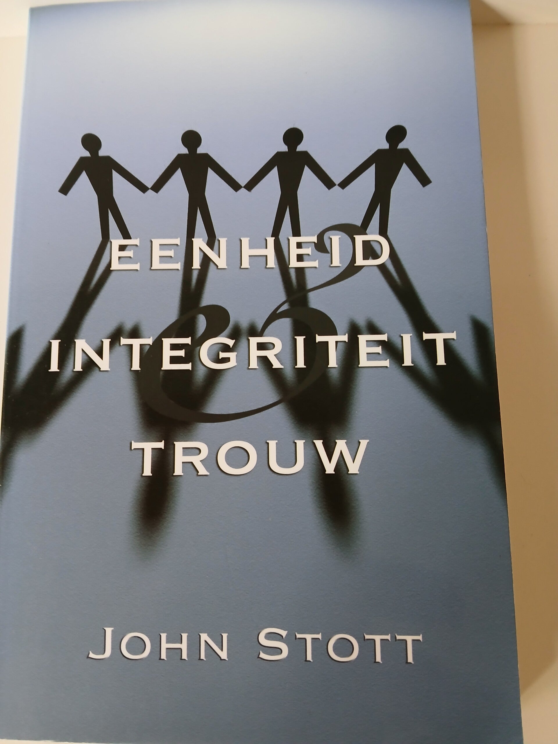 Eenheid Intergriteit Trouw. Schrijver: John Stott