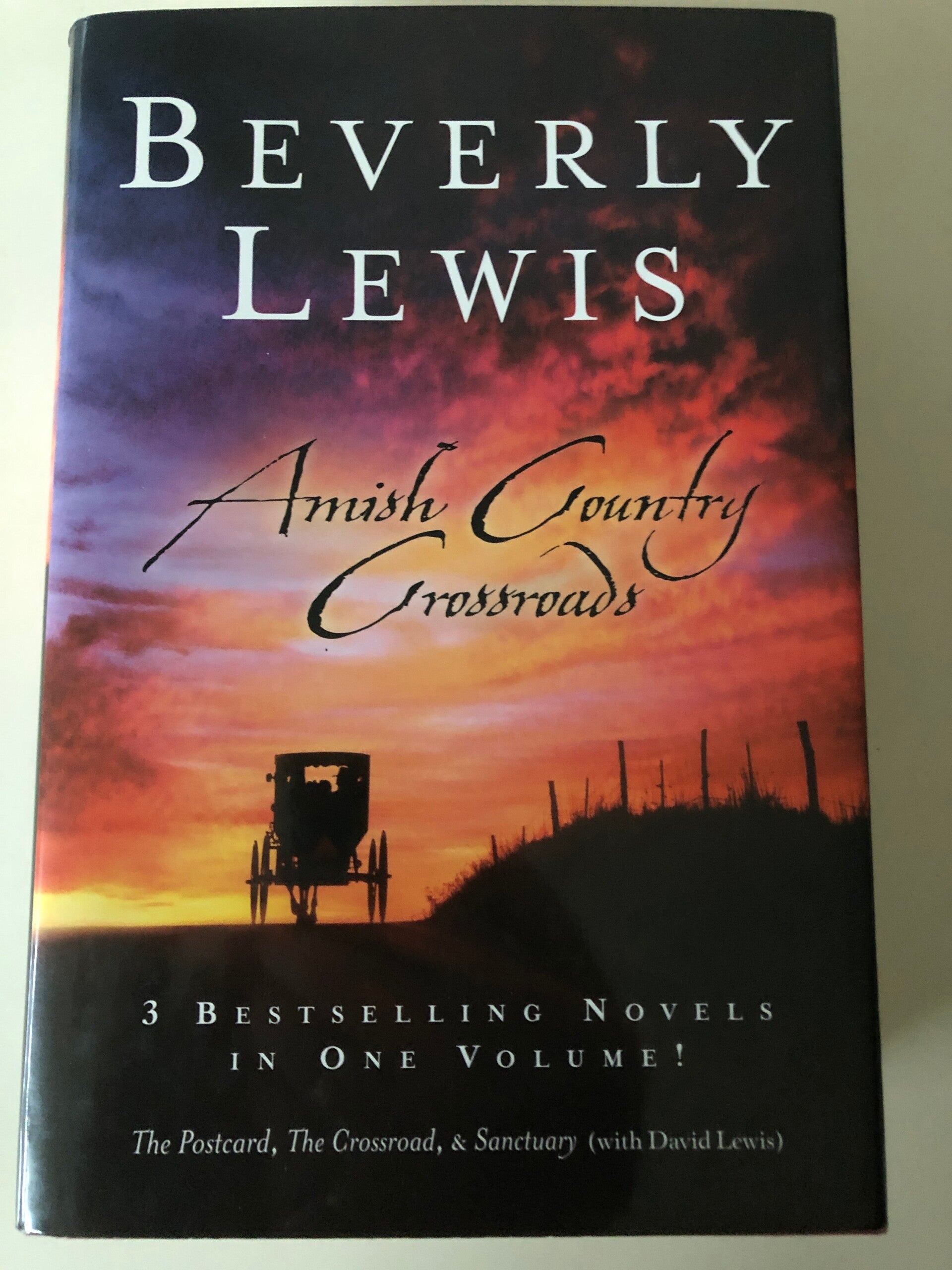 Amish Country Crossroads. 3 bestelling Novels in One Volume! The postcard, The Crossroad. Sanctuary. Schrijver: bervely Lewis.