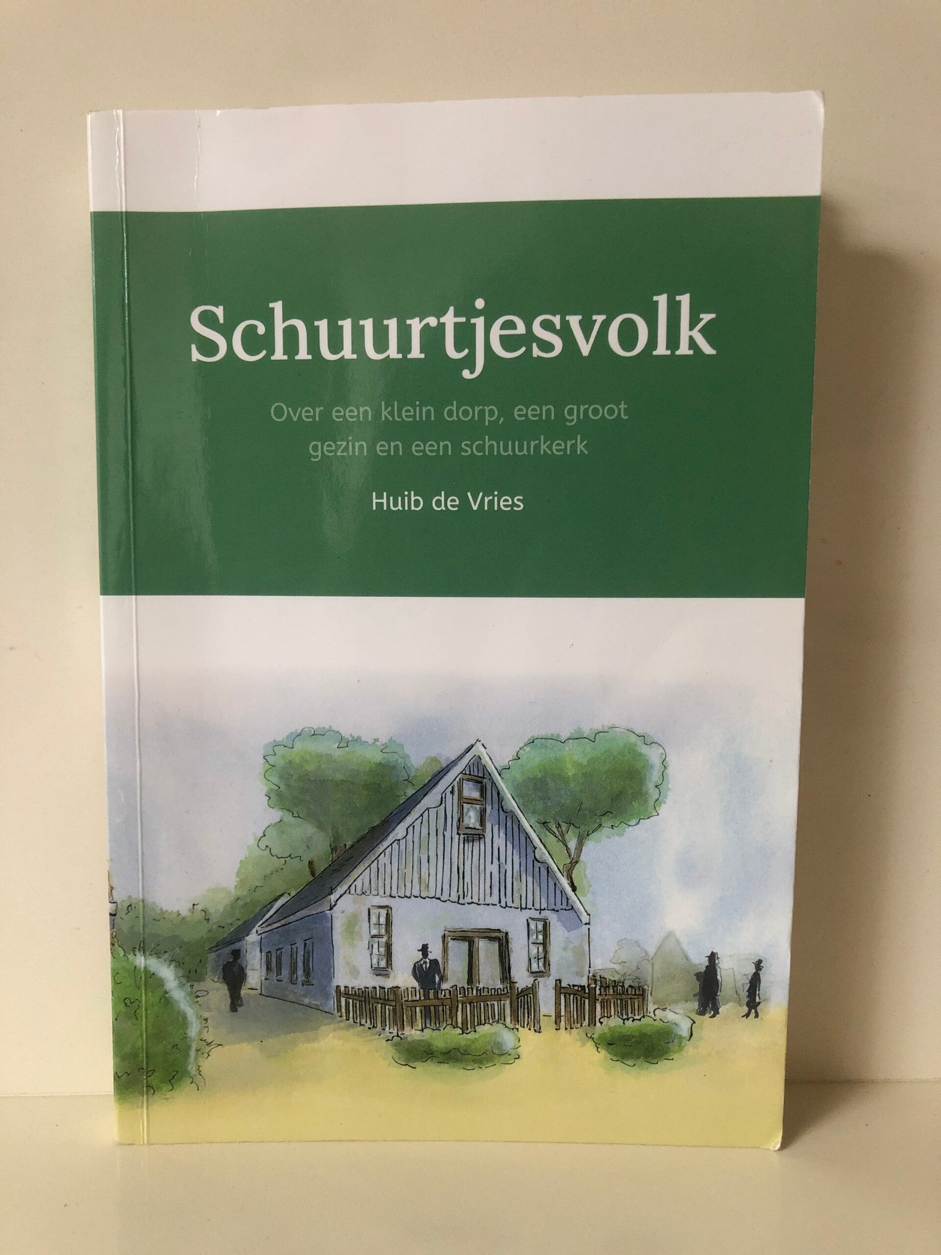 Schuurtjesvolk.Over een klein dorp , een groot gezin en een schuurkerk. Schrijver: Huib de Vries