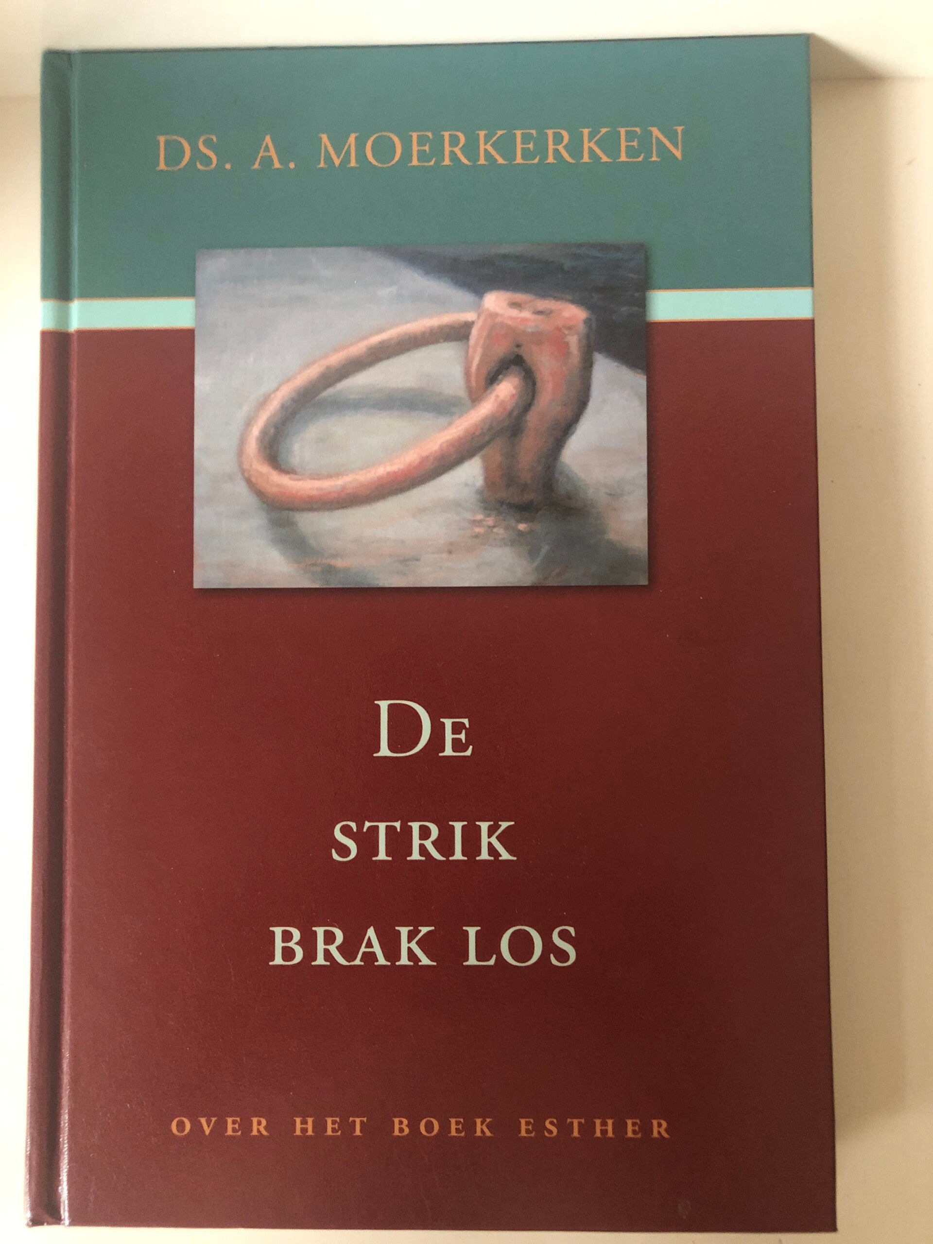 De strik brak los. Over het boek Esther. Schrijver: Ds.A.Moerkerken