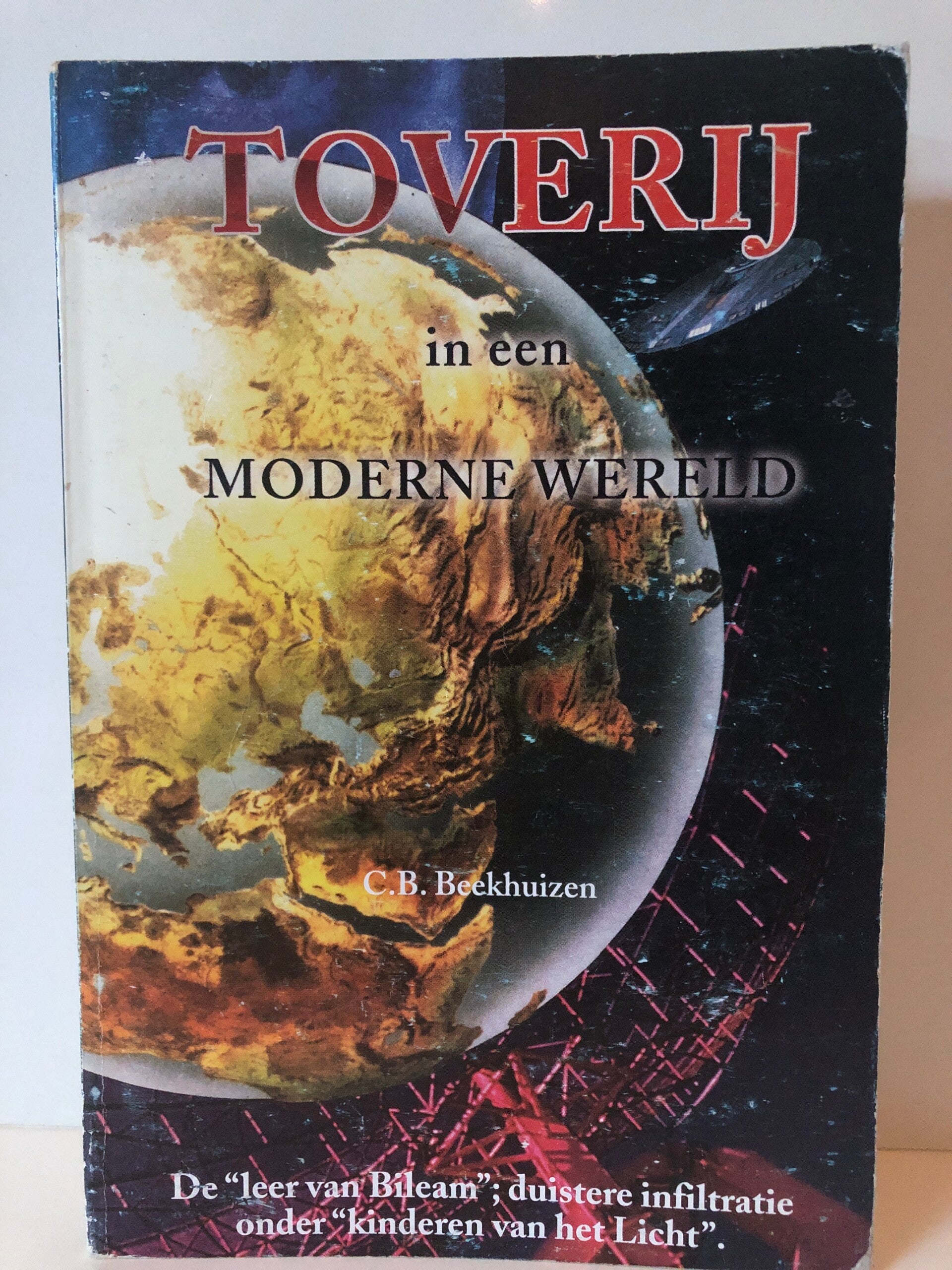 Toverij in een moderne wereld. Schrijver: C.B.Beekhuizen