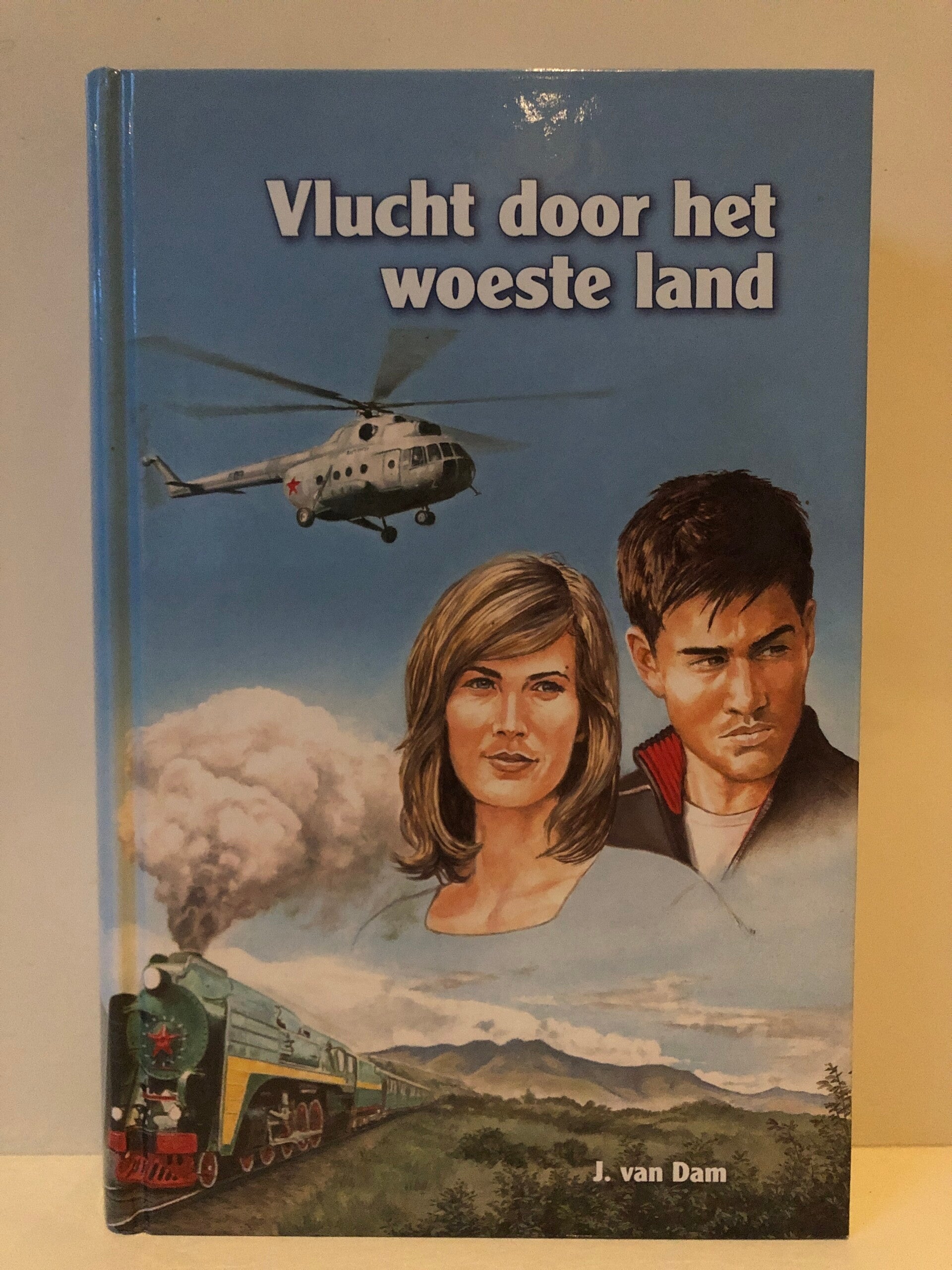 Vlucht door het woeste land. Schrijver: J.van dam