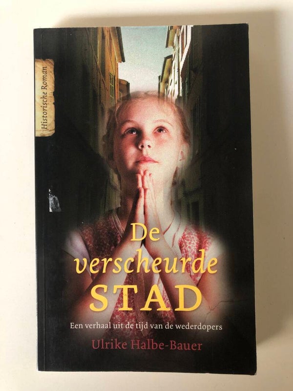 De verscheurde stad. En verhaal uit de tijd van de wederdopers. Schrijver: Ulrike Halbe - Bauer