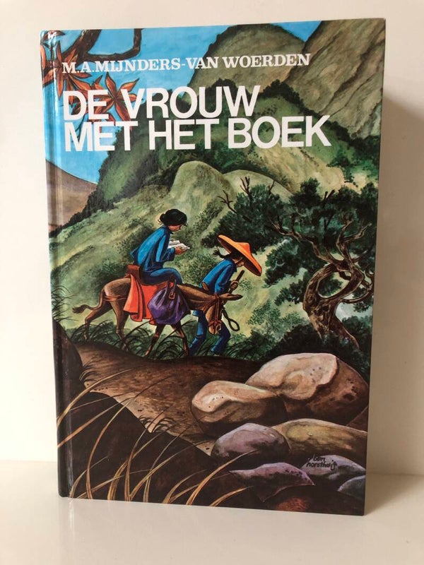 De vrouw met het boek. Schrrijver: M.A.Mijnders- van Woerden