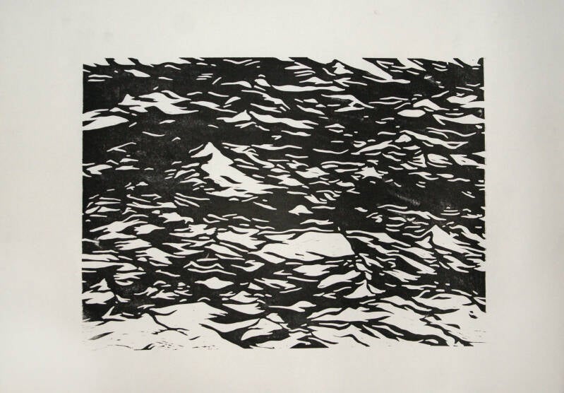 black and white linocut of waves