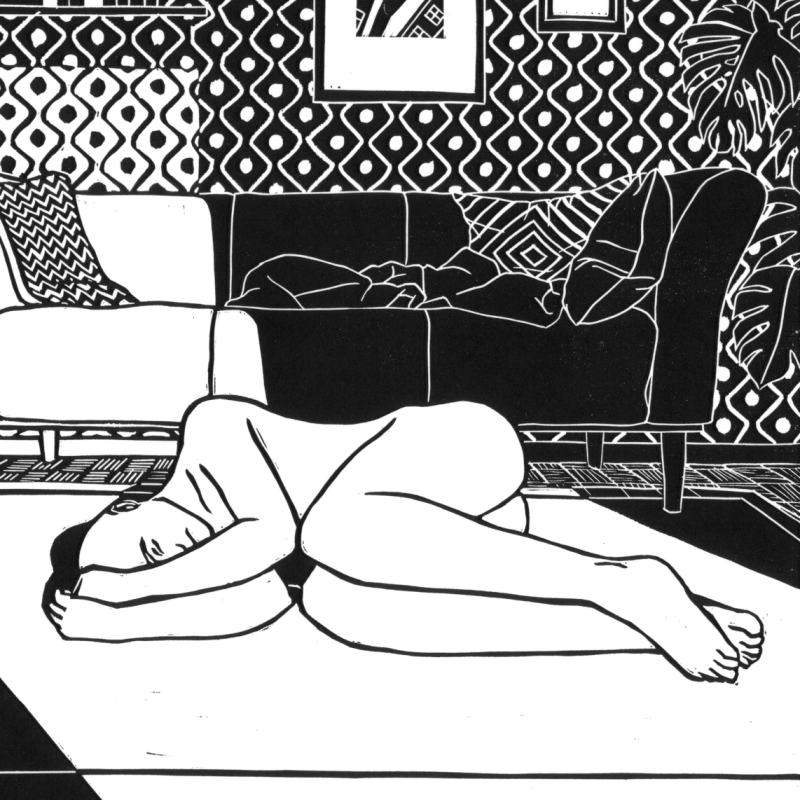 black and white linocut, close up of the person lying on the carpet