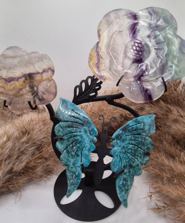 Blumen mit Schmetterling auf Ständer