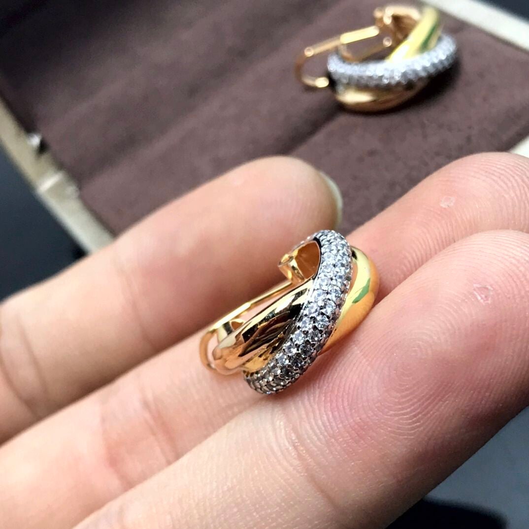 CARTIER Aretes dorados