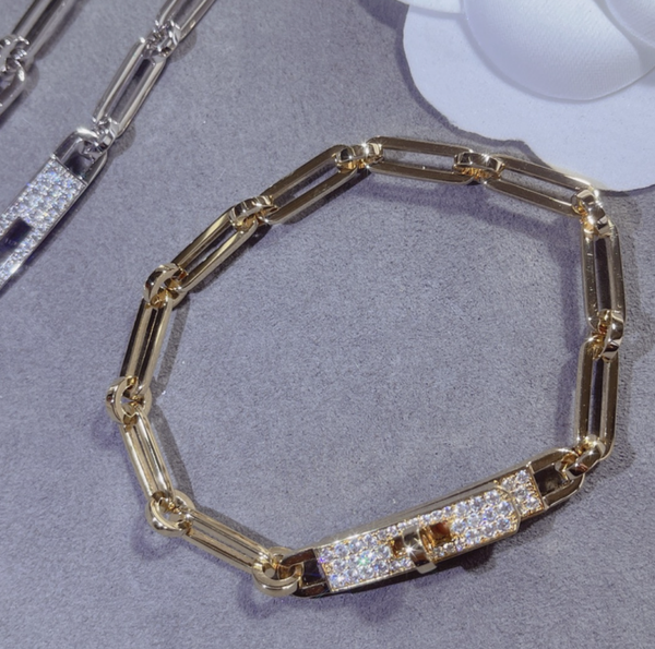 HERMES Pulsera (Plateada y Dorada)