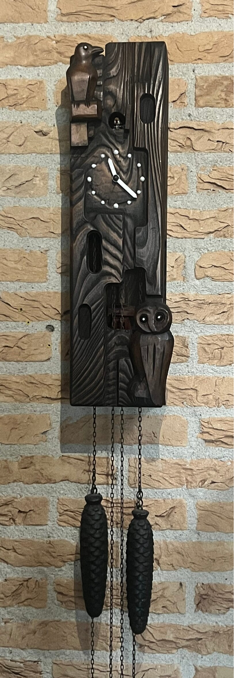 K15: Hubert Herr 8-daagse koekoeksklok met raaf- en uilfiguren (ca. 1975)