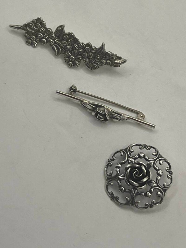 Z26: Zilveren rozen broche