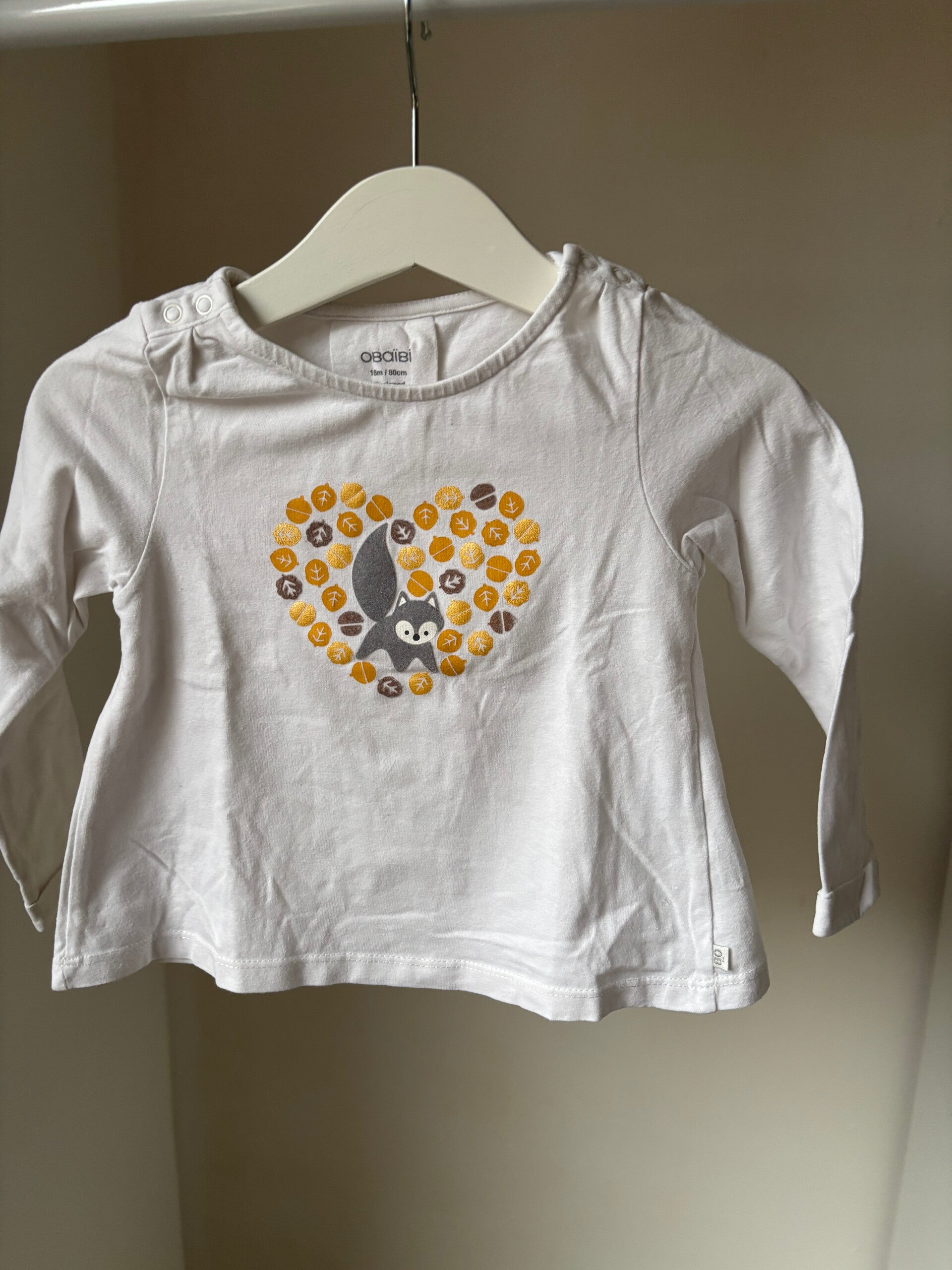 Witte longsleeve met blaadjes