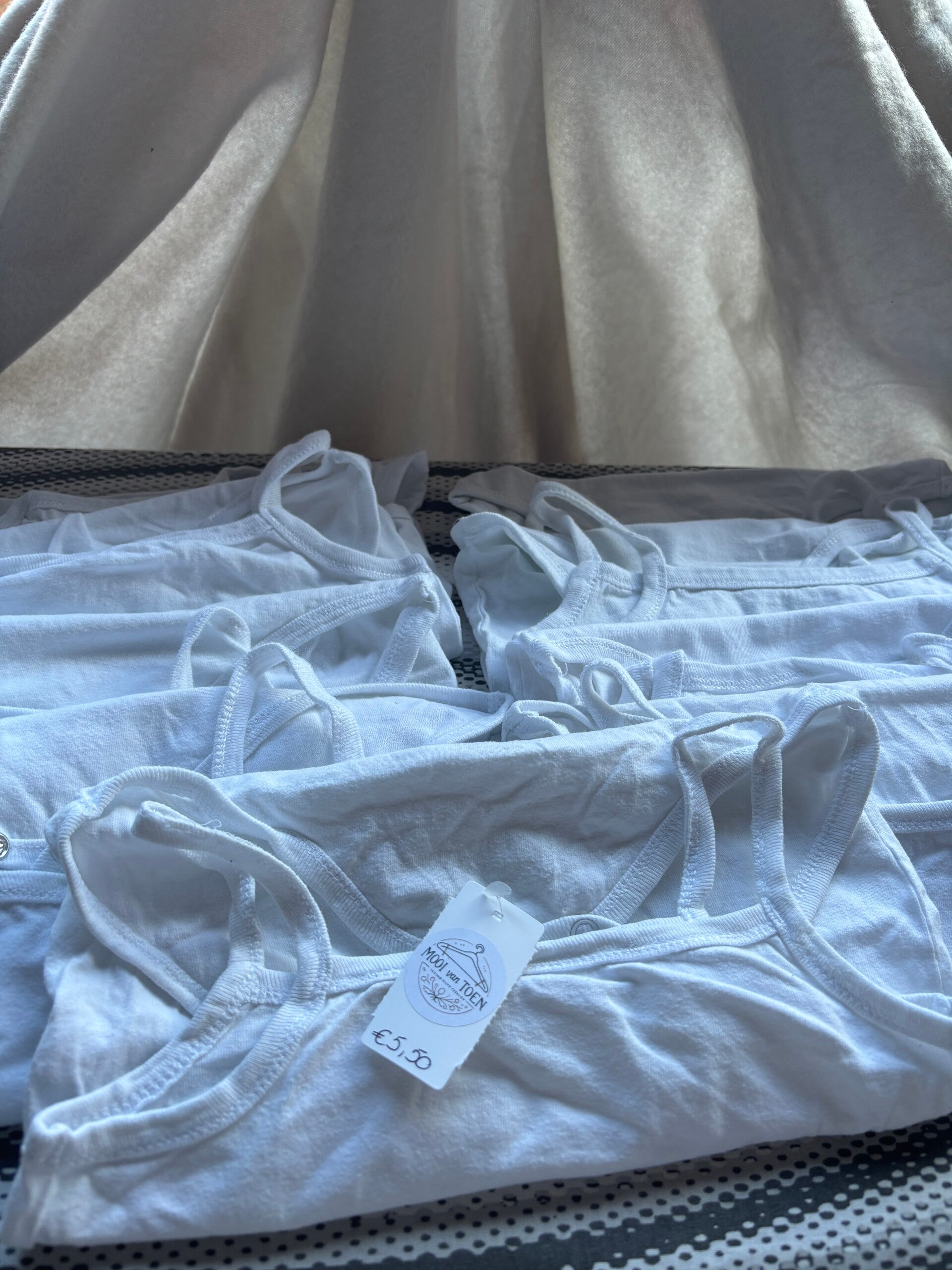 Bundel witte rompers zonder mouwen (9)